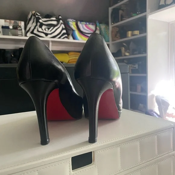 Christian Louboutin black leather pumps. Size 9… Good condition